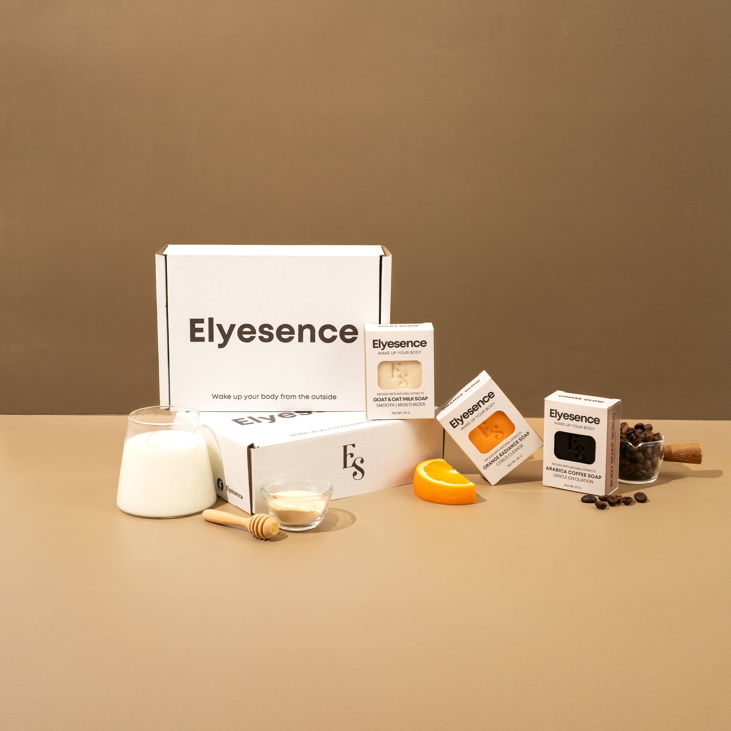 Elyesence Explorer Box with three standing soaps and ingredients displayed around the packaging